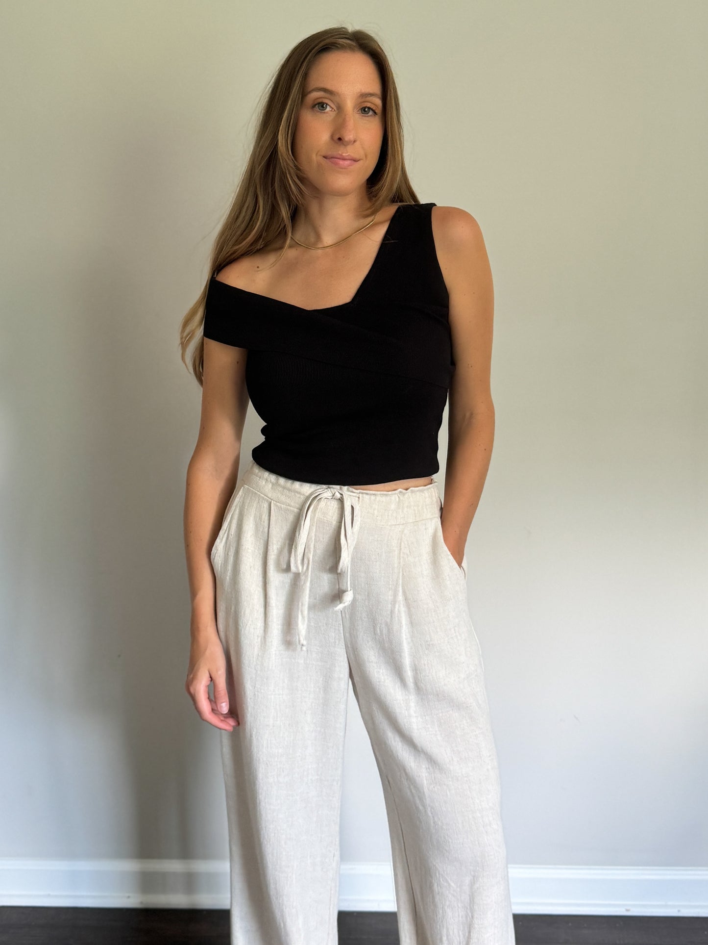 drawstring linen pants and black knit top