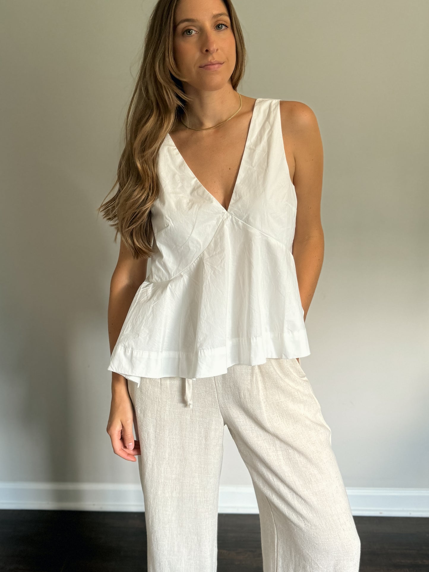 white v-neck flare out top