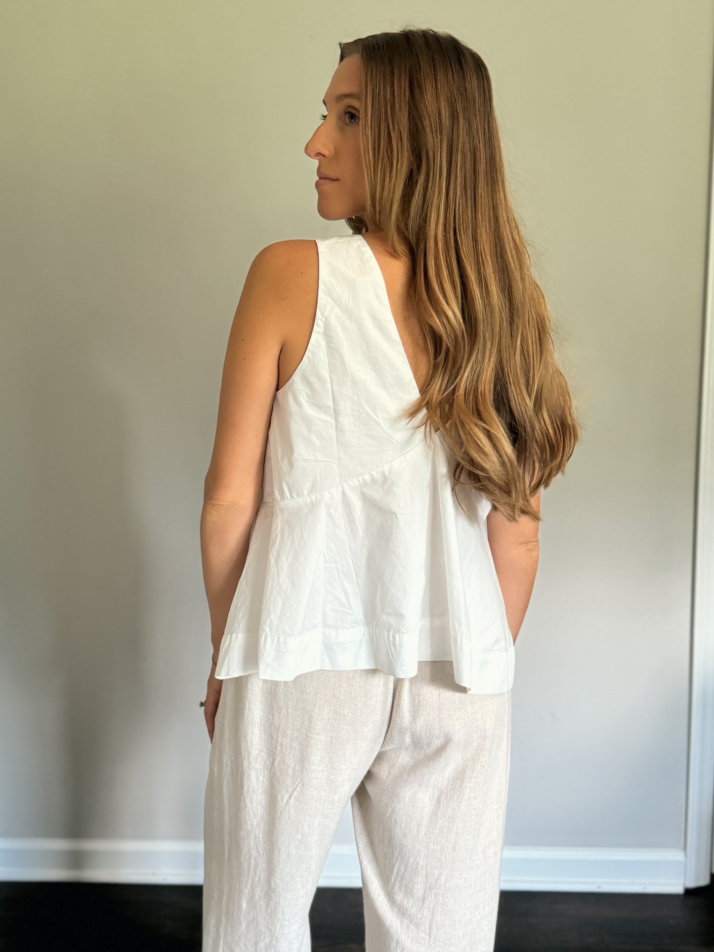 white v-neck flare out top